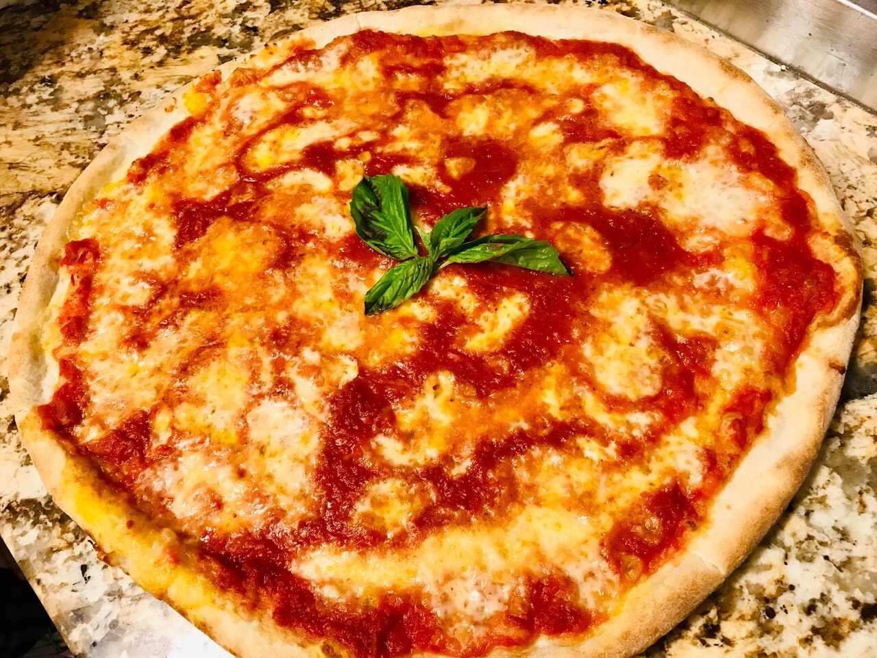 Wood-fired pizza at Il Forno Italian restaurant, Alberton